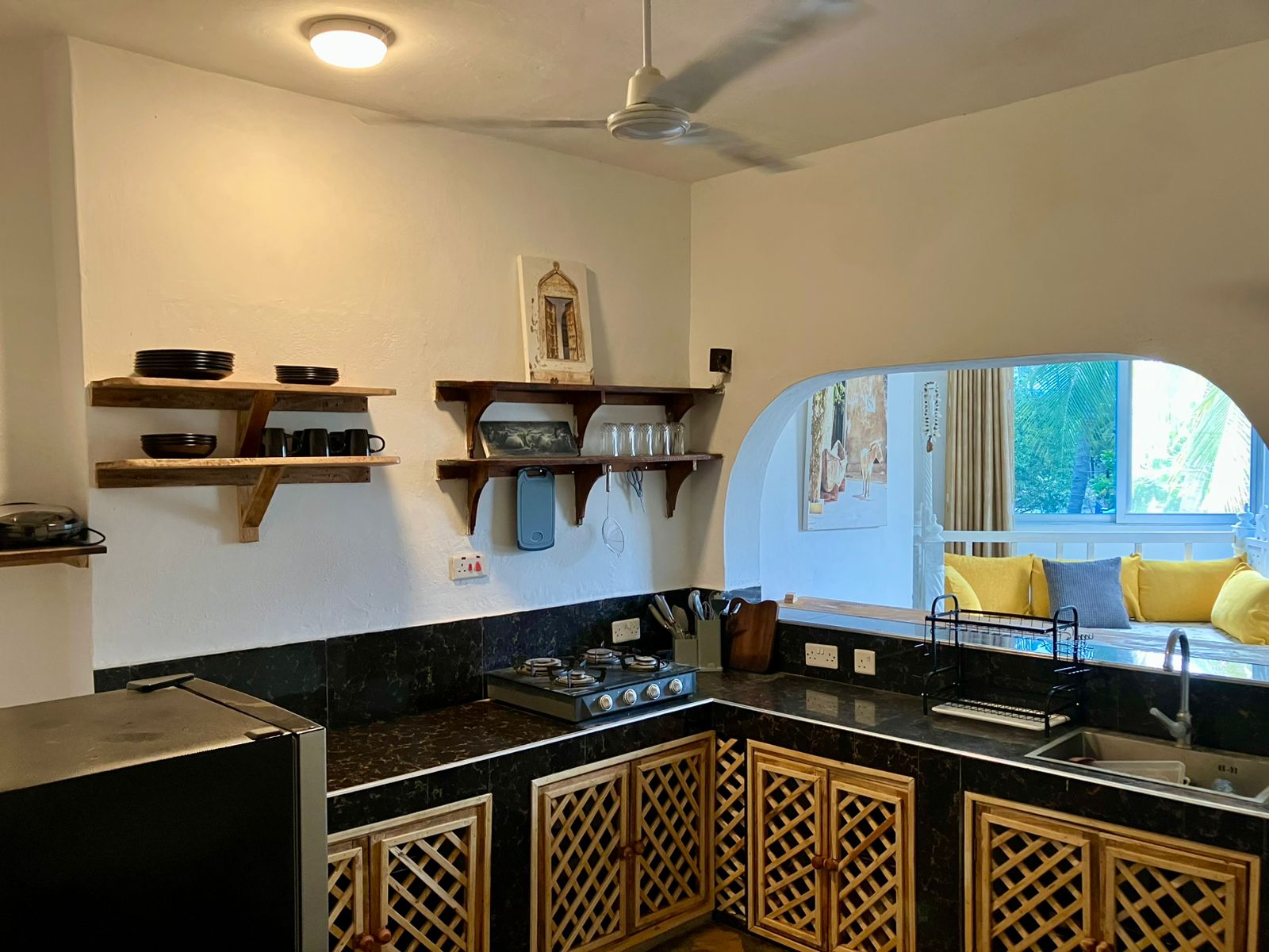 1.5-bedroom beachfront apartment at Oasis Malindi with ocean and pool views, available for short- and long-term rent.