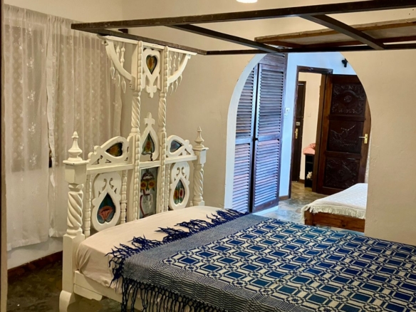 1.5-bedroom beachfront apartment at Oasis Malindi with ocean and pool views, available for short- and long-term rent.