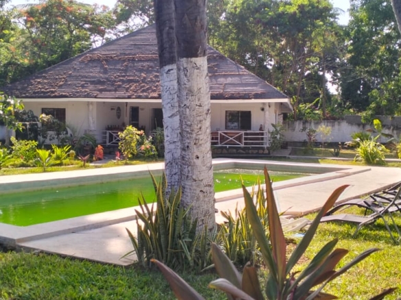 4-bedroom villa for long-term rent in Kibokoni Malindi with shared swimming pool in a gated compound.