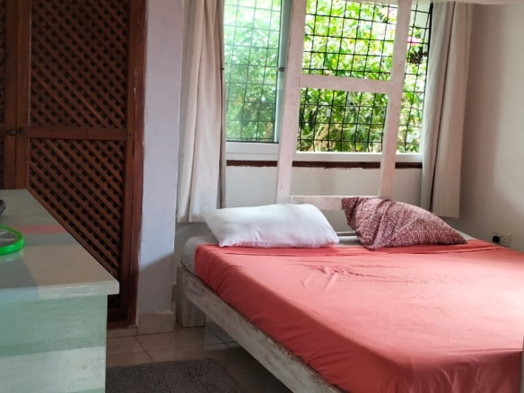 2-bedroom standalone villa on an eighth-acre plot for sale off Casuarina Road, featuring solid construction, serene surroundings, and expansion potential.