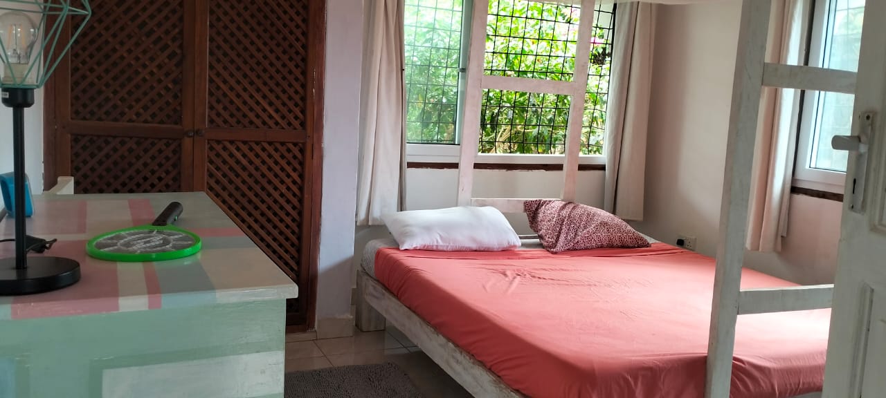 2-bedroom standalone villa on an eighth-acre plot for sale off Casuarina Road, featuring solid construction, serene surroundings, and expansion potential.