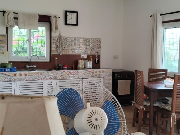 2-bedroom standalone villa on an eighth-acre plot for sale off Casuarina Road, featuring solid construction, serene surroundings, and expansion potential.