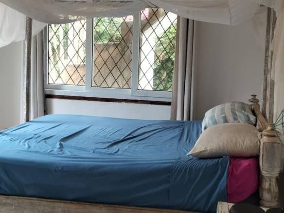 2-bedroom standalone villa on an eighth-acre plot for sale off Casuarina Road, featuring solid construction, serene surroundings, and expansion potential.