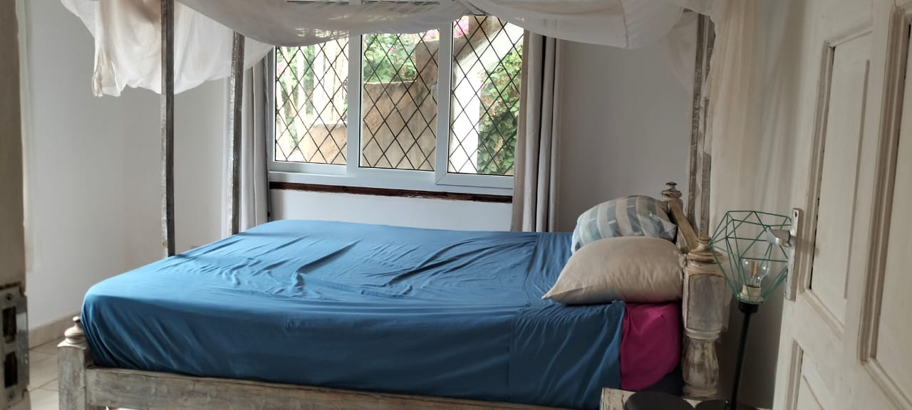 2-bedroom standalone villa on an eighth-acre plot for sale off Casuarina Road, featuring solid construction, serene surroundings, and expansion potential.