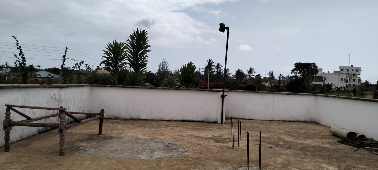 2-bedroom standalone villa on an eighth-acre plot for sale off Casuarina Road, featuring solid construction, serene surroundings, and expansion potential.