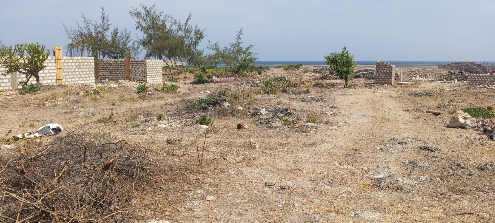 One-acre oceanfront cliff land for sale in Watamu featuring panoramic Indian Ocean views, prime location, and luxury development potential.
