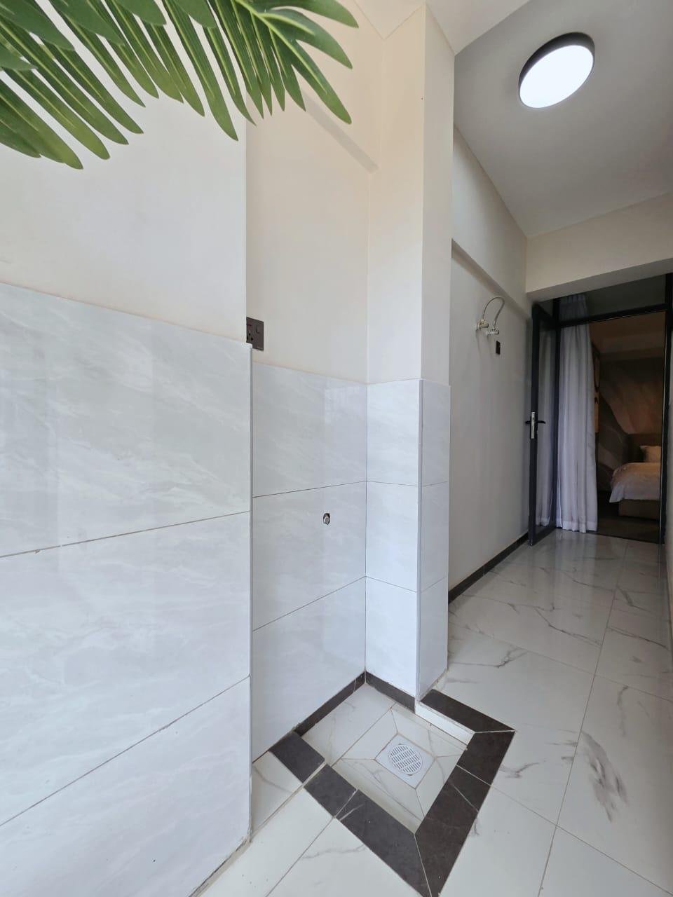 Modern 1, 2, and 3-bedroom apartments for sale at Tsavorite Gardens in Kilimani, Nairobi, offering elegant living and strong investment value.