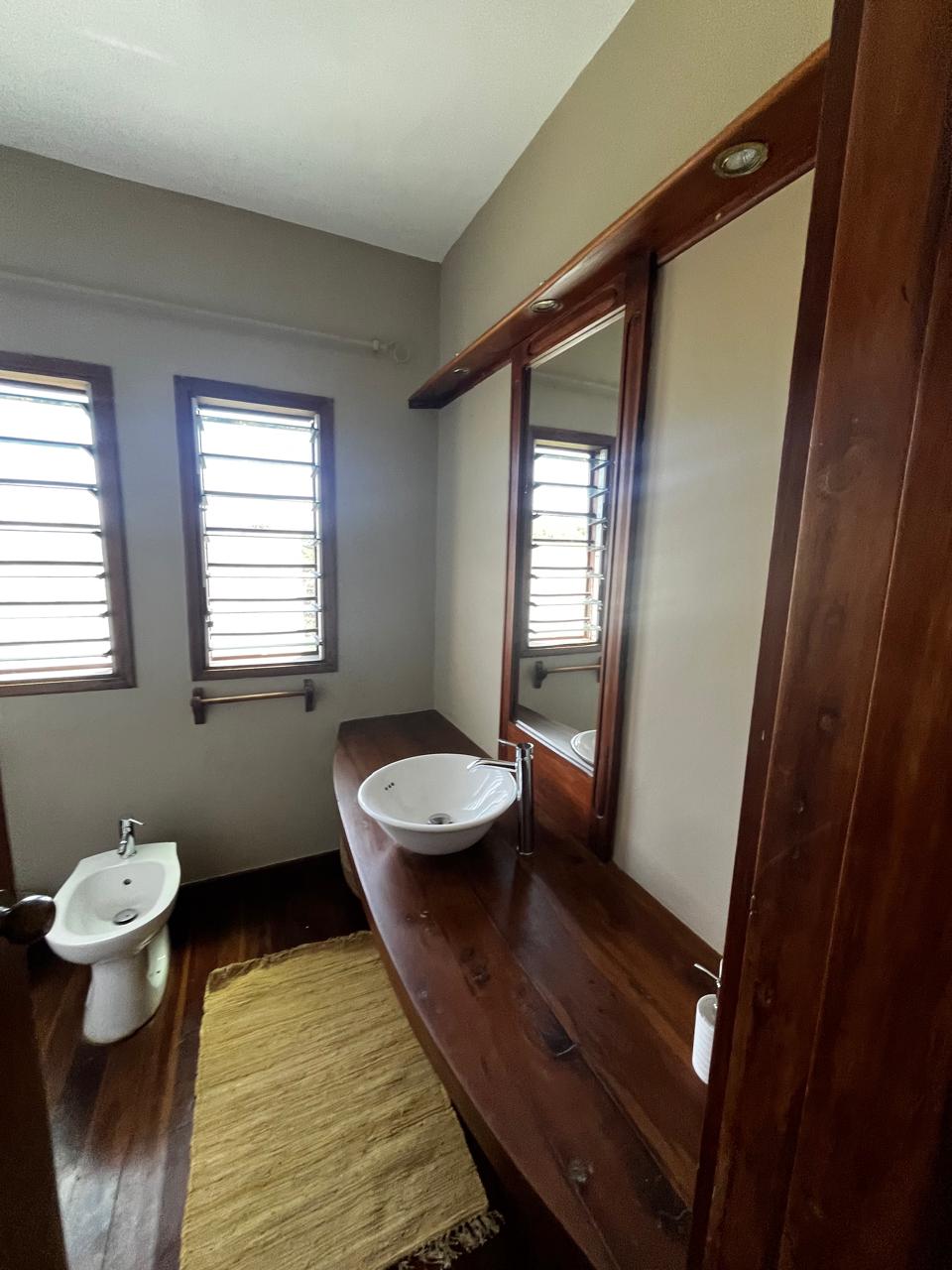 Luxury penthouse studio with private jacuzzi for short-term rental at Beverly Suites, Silversands Road, 100 meters from the beach.