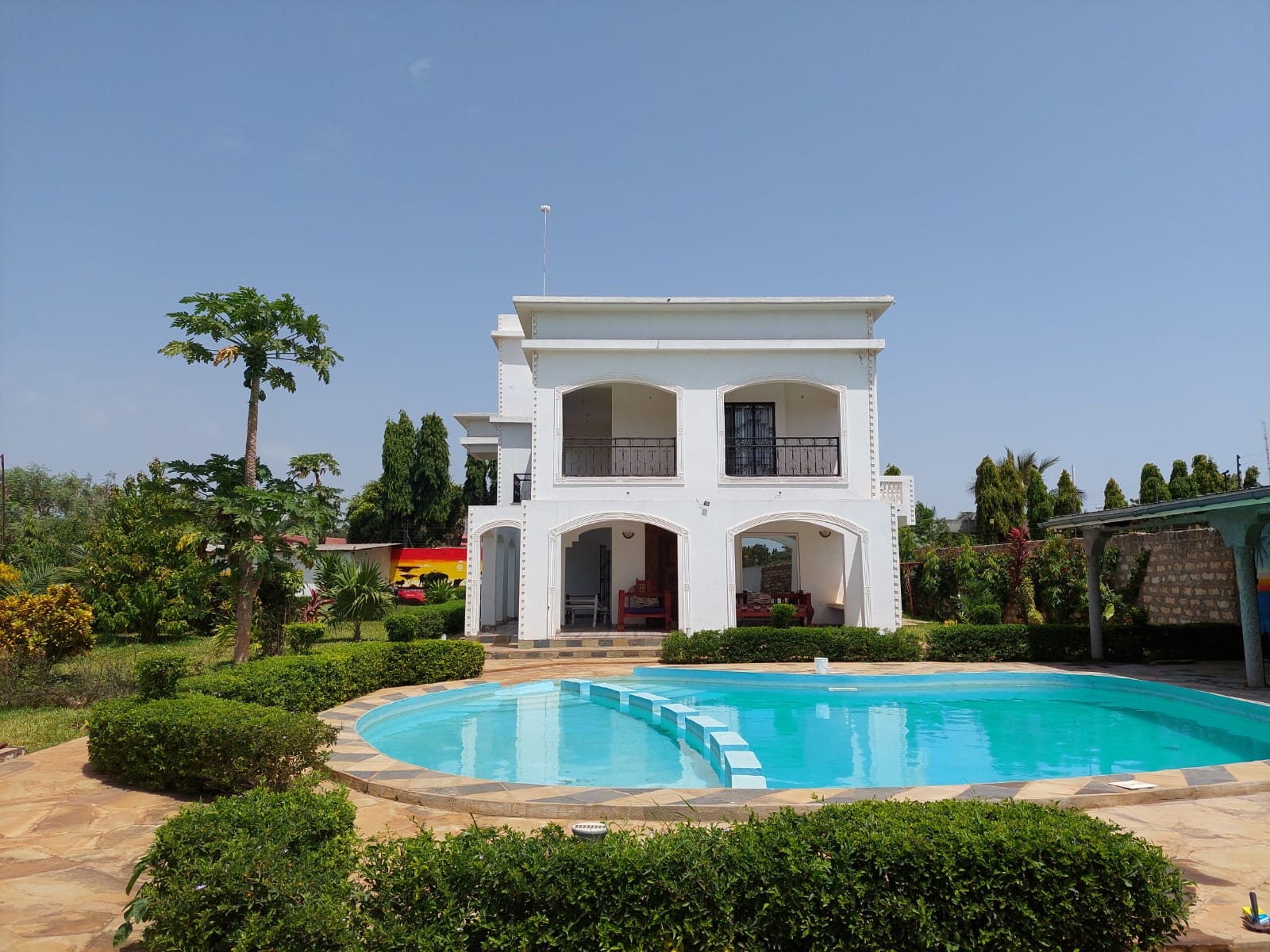 Luxury 4-bedroom furnished villa with private swimming pool for short stays in Casuarina, featuring a walled compound and premium amenities.