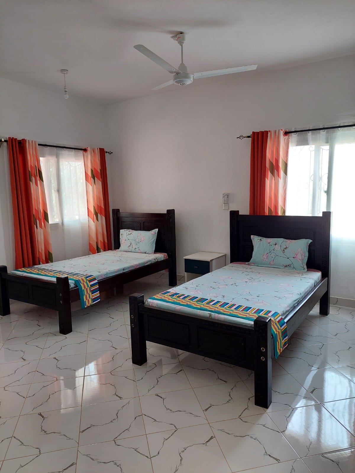 Luxury 4-bedroom furnished villa with private swimming pool for short stays in Casuarina, featuring a walled compound and premium amenities.