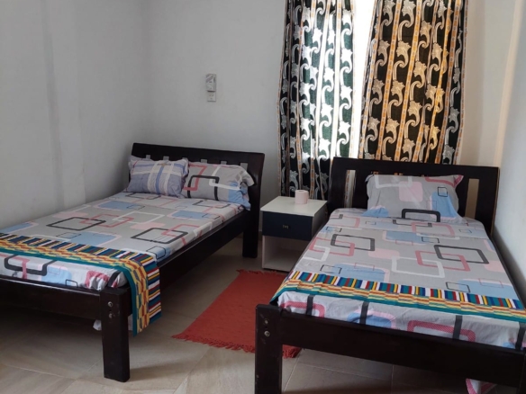 Luxury 4-bedroom furnished villa with private swimming pool for short stays in Casuarina, featuring a walled compound and premium amenities.