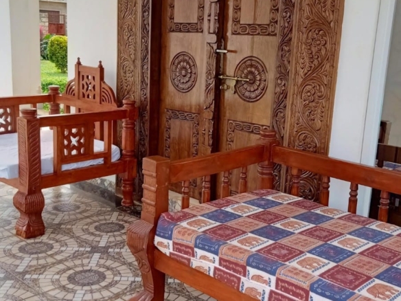 Luxury 4-bedroom furnished villa with private swimming pool for short stays in Casuarina, featuring a walled compound and premium amenities.