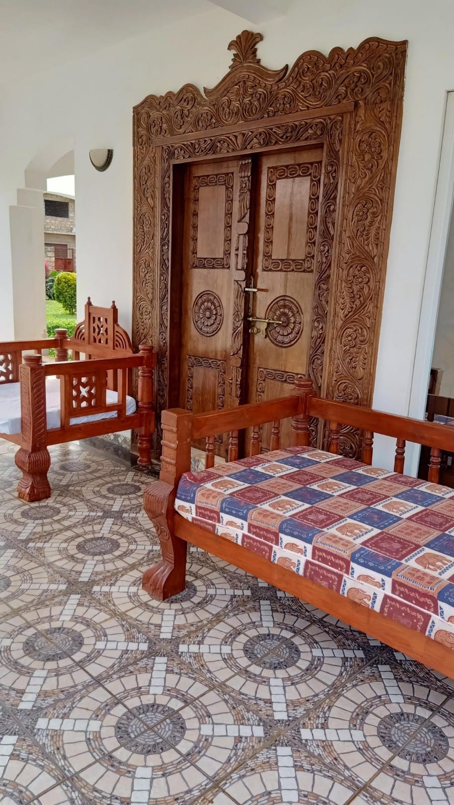 Luxury 4-bedroom furnished villa with private swimming pool for short stays in Casuarina, featuring a walled compound and premium amenities.