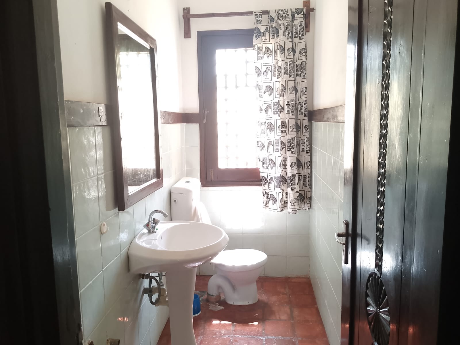 Spacious furnished 2-bedroom beachfront home with pool and garden in Kilimandogo Malindi for rent.