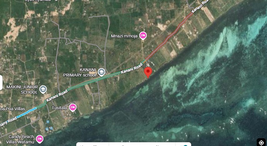 One-acre oceanfront cliff land for sale in Watamu featuring panoramic Indian Ocean views, prime location, and luxury development potential.