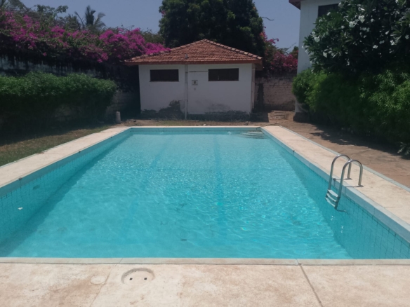 2-bedroom apartment for sale at Bubbles Residence in Casuarina featuring a swimming pool, gym, gated community security, and easy beach access.