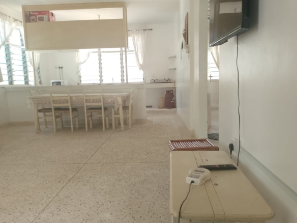 2-bedroom apartment for sale at Bubbles Residence in Casuarina featuring a swimming pool, gym, gated community security, and easy beach access.