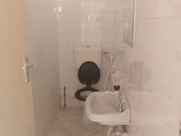 2-bedroom apartment for sale at Bubbles Residence in Casuarina featuring a swimming pool, gym, gated community security, and easy beach access.