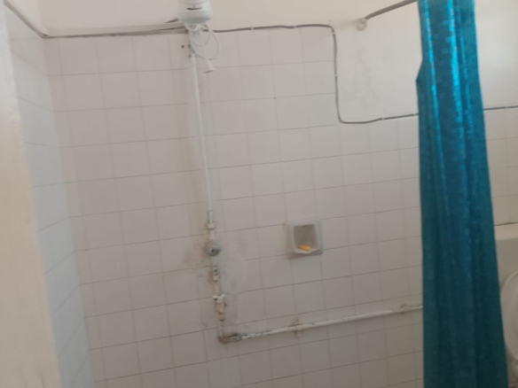 2-bedroom apartment for sale at Bubbles Residence in Casuarina featuring a swimming pool, gym, gated community security, and easy beach access.