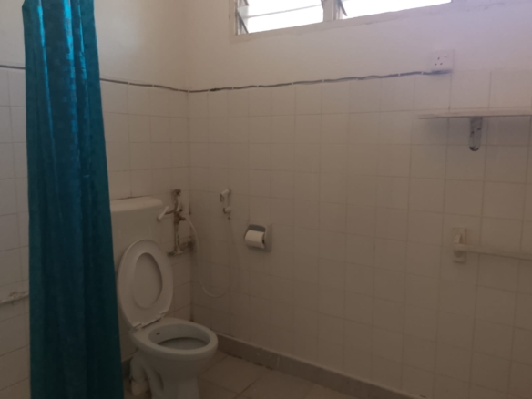 2-bedroom apartment for sale at Bubbles Residence in Casuarina featuring a swimming pool, gym, gated community security, and easy beach access.