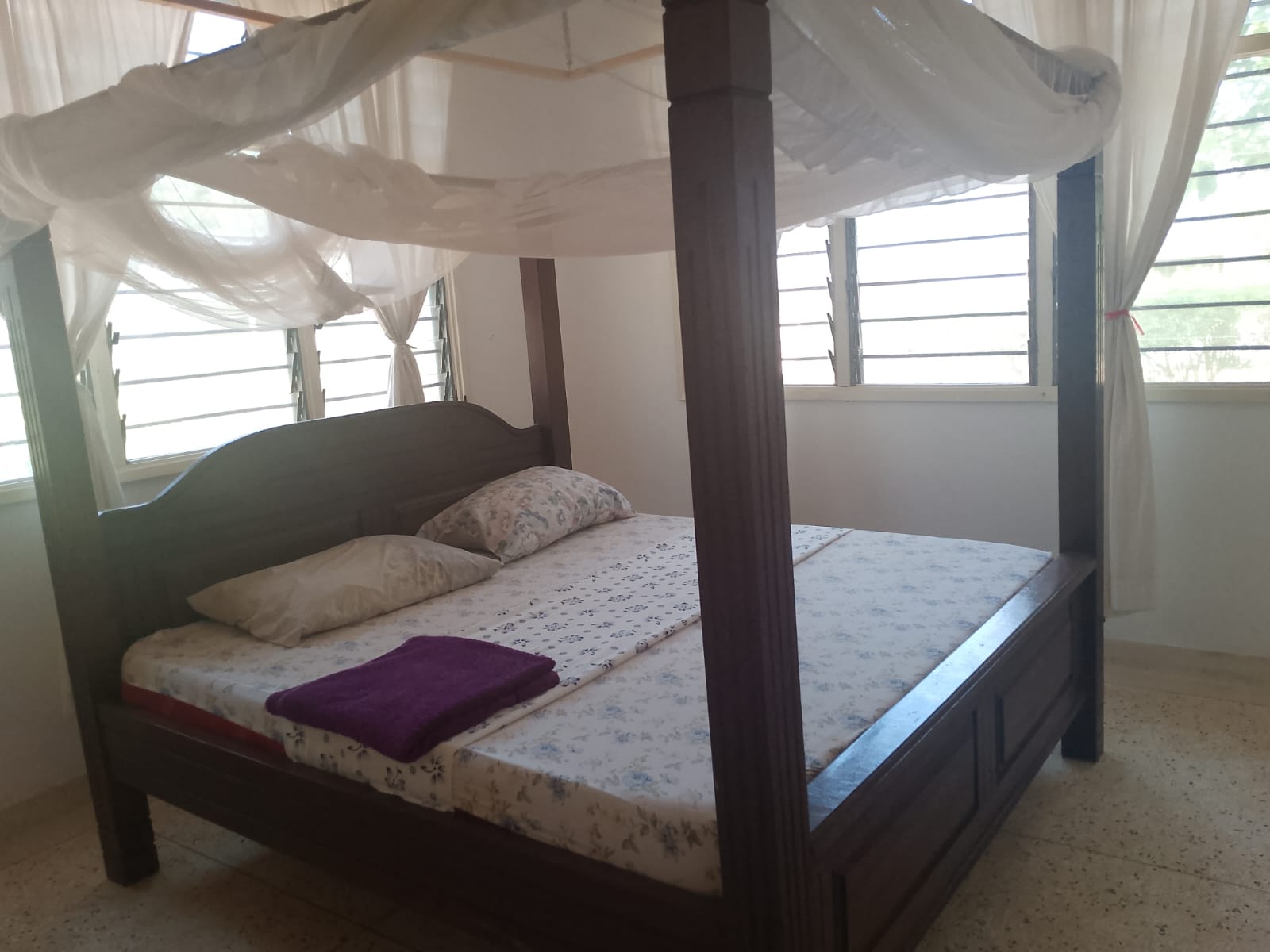 2-bedroom apartment for sale at Bubbles Residence in Casuarina featuring a swimming pool, gym, gated community security, and easy beach access.