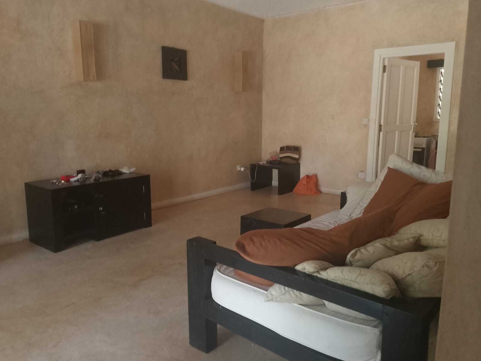 Luxury 1-bedroom beachfront apartment at The Lawford Kenya with ocean views, swimming pools, restaurant, and entertainment facilities available for long-term rent.