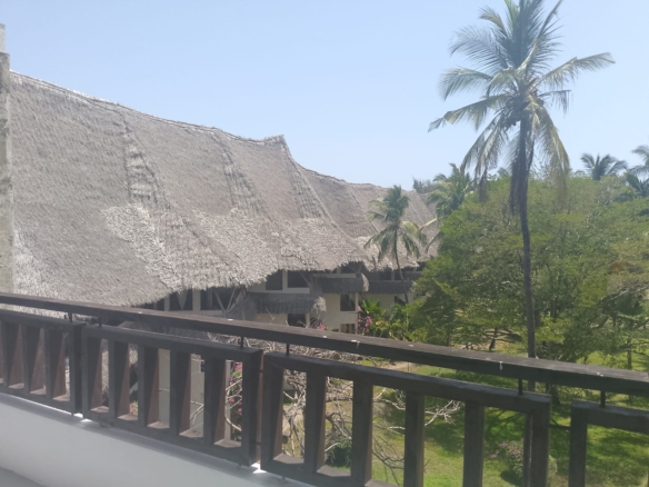 2-bedroom beachfront apartment for rent at Lawfords Malindi with swimming pools, gardens, entertainment facilities, and ocean views.