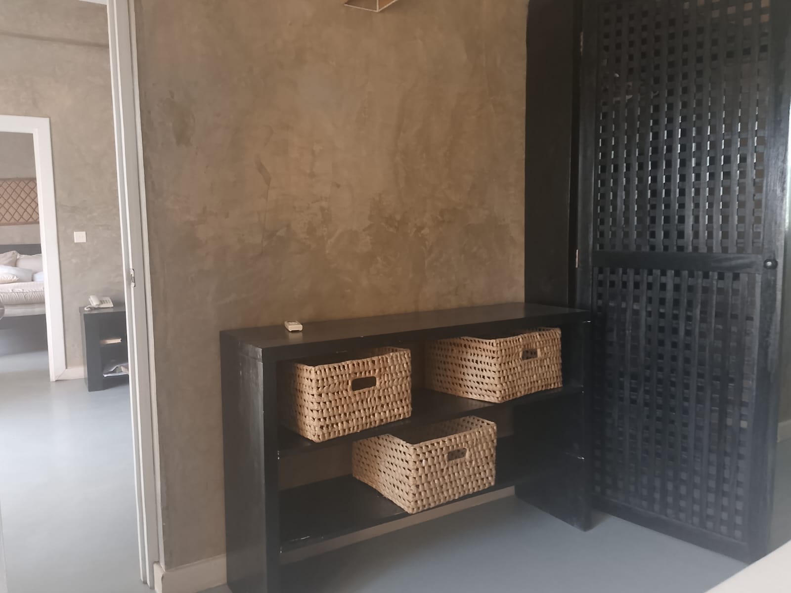 2-bedroom beachfront apartment for rent at Lawfords Malindi with swimming pools, gardens, entertainment facilities, and ocean views.