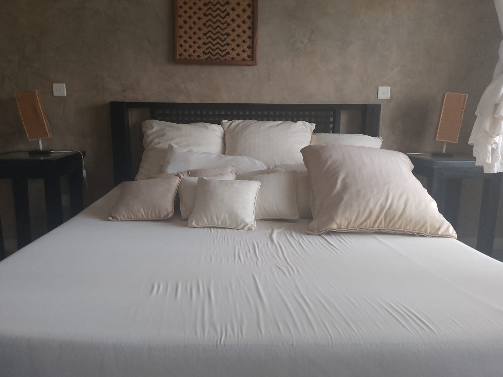 2-bedroom beachfront apartment for rent at Lawfords Malindi with swimming pools, gardens, entertainment facilities, and ocean views.