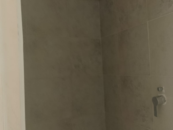 2-bedroom beachfront apartment for rent at Lawfords Malindi with swimming pools, gardens, entertainment facilities, and ocean views.