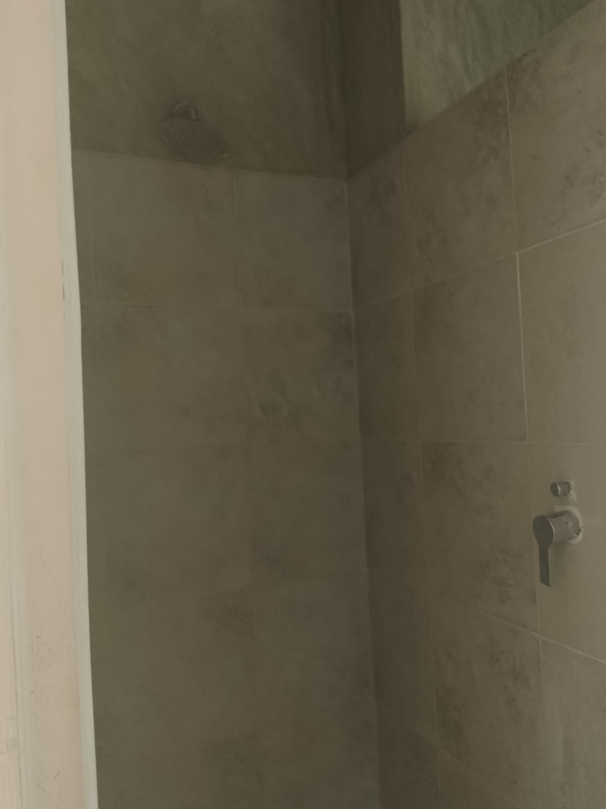 2-bedroom beachfront apartment for rent at Lawfords Malindi with swimming pools, gardens, entertainment facilities, and ocean views.