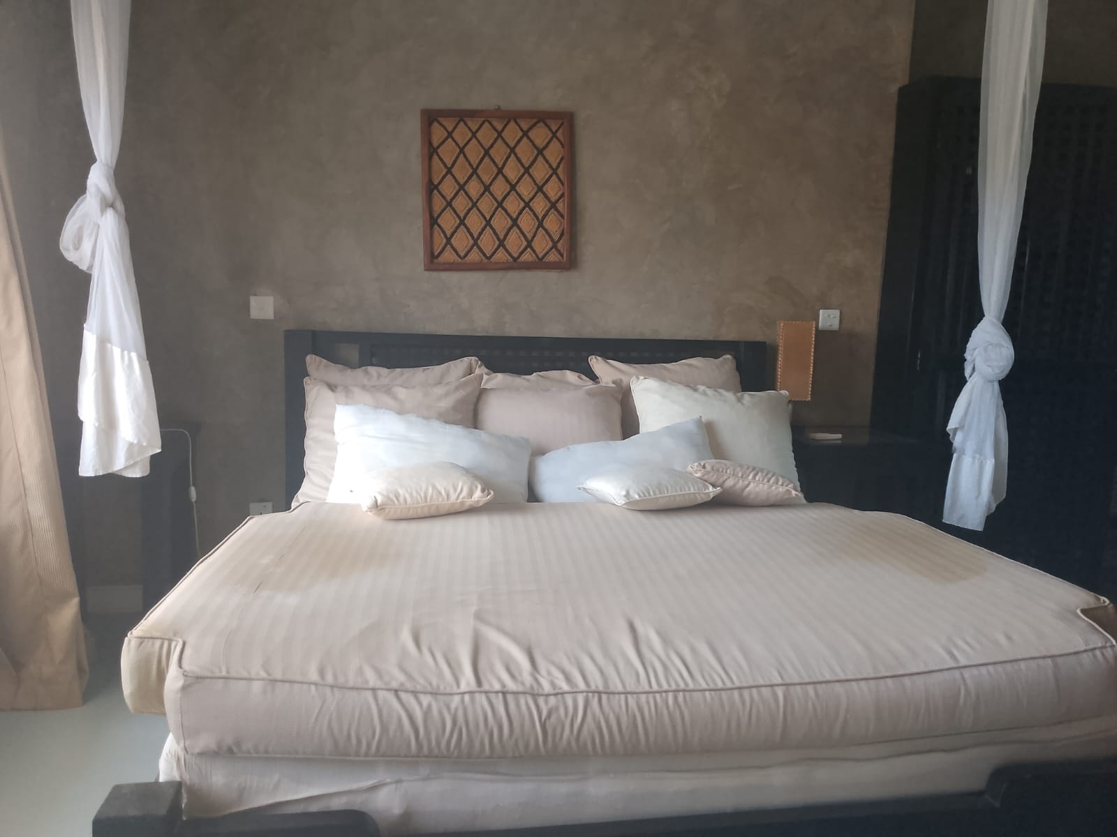 2-bedroom beachfront apartment for rent at Lawfords Malindi with swimming pools, gardens, entertainment facilities, and ocean views.