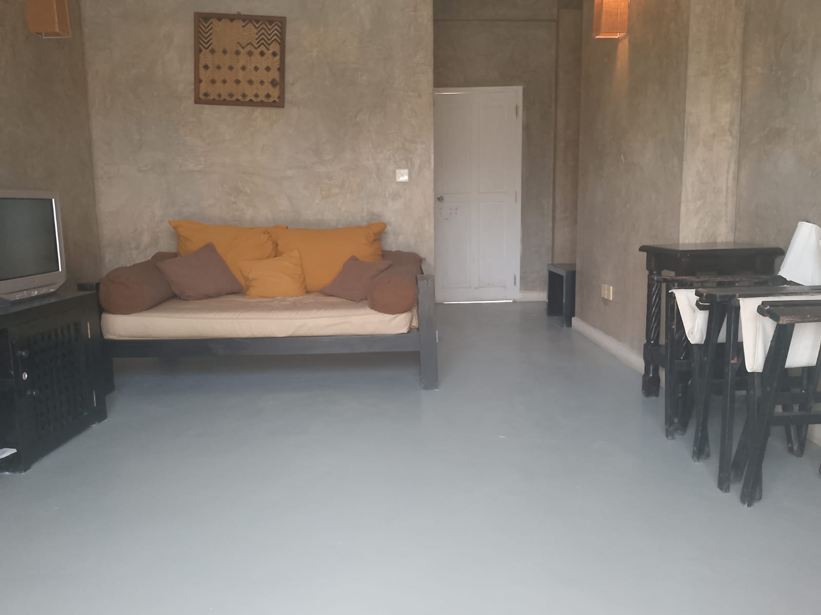 2-bedroom beachfront apartment for rent at Lawfords Malindi with swimming pools, gardens, entertainment facilities, and ocean views.