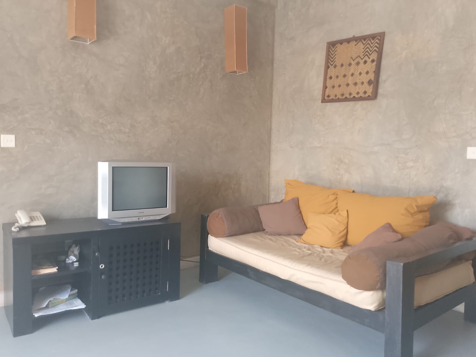 2-bedroom beachfront apartment for rent at Lawfords Malindi with swimming pools, gardens, entertainment facilities, and ocean views.