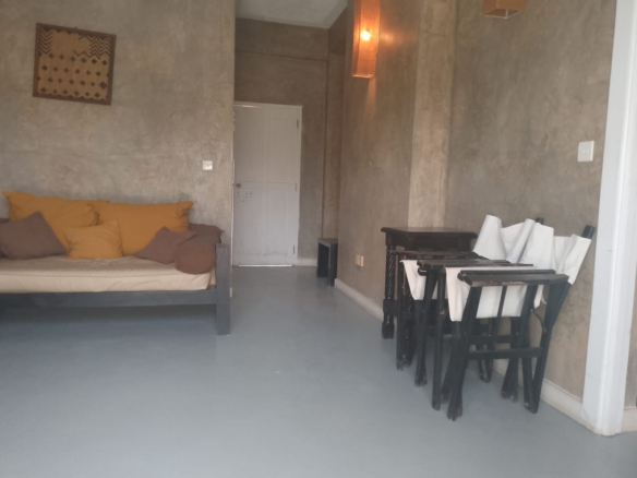 2-bedroom beachfront apartment for rent at Lawfords Malindi with swimming pools, gardens, entertainment facilities, and ocean views.