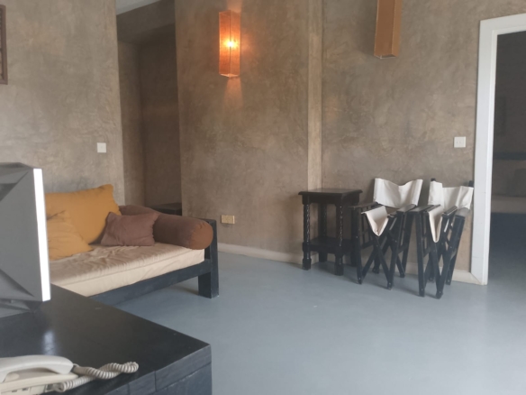 2-bedroom beachfront apartment for rent at Lawfords Malindi with swimming pools, gardens, entertainment facilities, and ocean views.