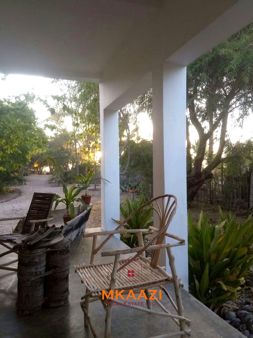 3-bedroom coastal home on 1-acre titled plot in Che Shale with solar panels, rainwater harvesting, balcony, and verandah. Expansion potential on adjoining 3/4-acre land.