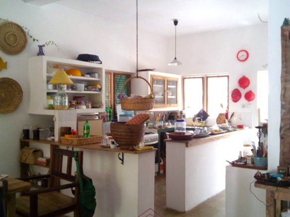 3-bedroom coastal home on 1-acre titled plot in Che Shale with solar panels, rainwater harvesting, balcony, and verandah. Expansion potential on adjoining 3/4-acre land.