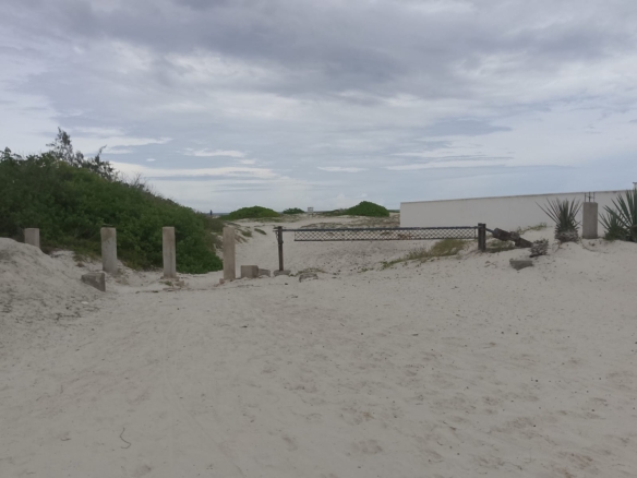 3 acres ocean-view land for sale along Bofa Road near Ngala Beach, featuring road frontage, subdivision potential, and a secure upscale neighborhood.