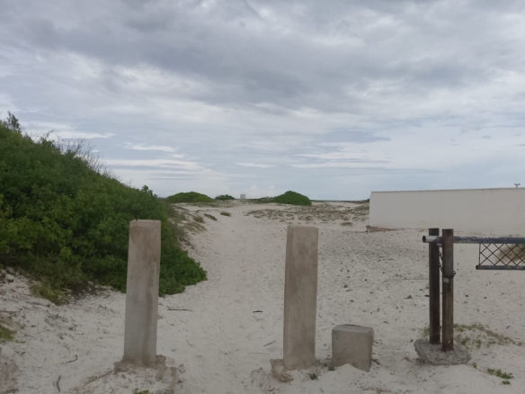 3 acres ocean-view land for sale along Bofa Road near Ngala Beach, featuring road frontage, subdivision potential, and a secure upscale neighborhood.