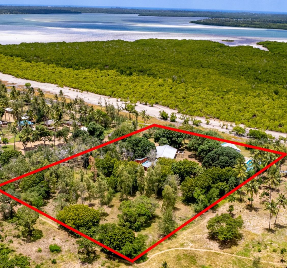 Luxury 2.7-acre creekfront property for sale in Mida Creek Watamu with ocean views, eco-lodge potential, and unique treehouse residence.