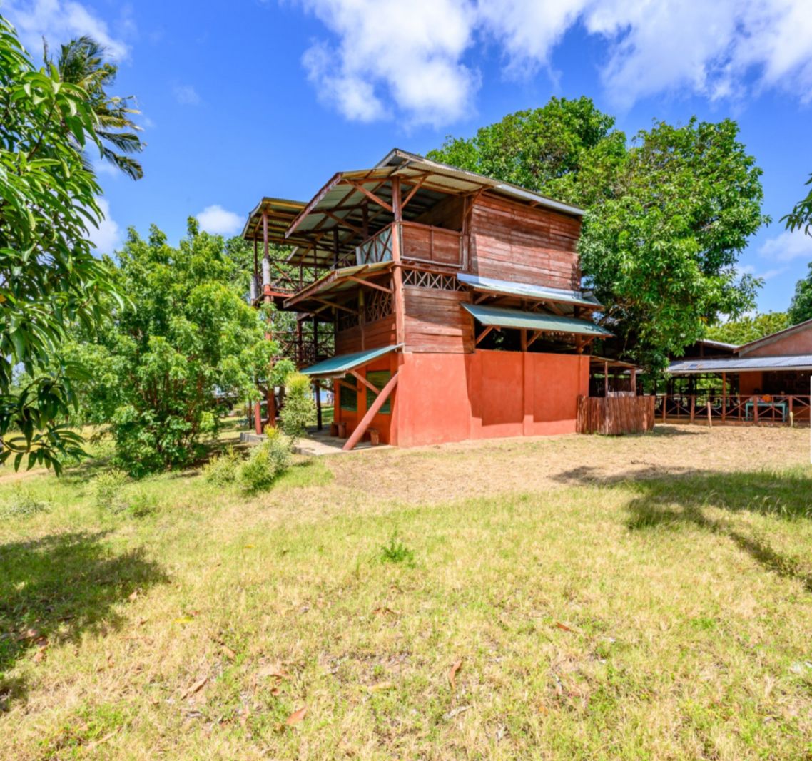 Luxury 2.7-acre creekfront property for sale in Mida Creek Watamu with ocean views, eco-lodge potential, and unique treehouse residence.