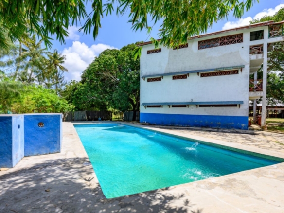 Luxury 2.7-acre creekfront property for sale in Mida Creek Watamu with ocean views, eco-lodge potential, and unique treehouse residence.