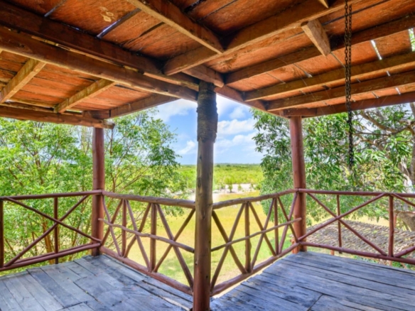 Luxury 2.7-acre creekfront property for sale in Mida Creek Watamu with ocean views, eco-lodge potential, and unique treehouse residence.