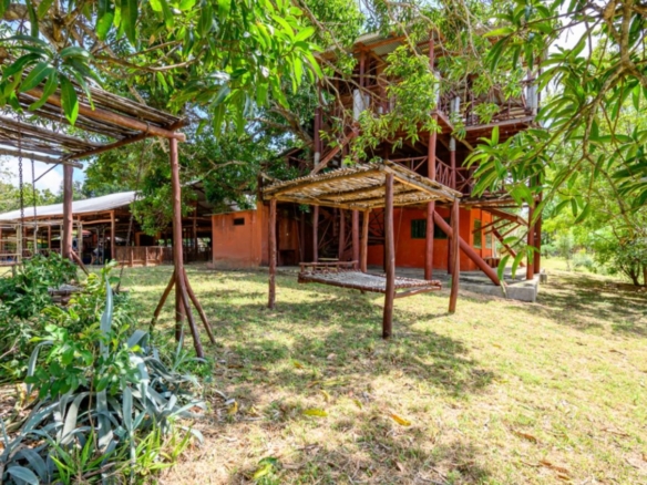 Luxury 2.7-acre creekfront property for sale in Mida Creek Watamu with ocean views, eco-lodge potential, and unique treehouse residence.