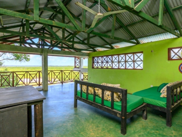 Luxury 2.7-acre creekfront property for sale in Mida Creek Watamu with ocean views, eco-lodge potential, and unique treehouse residence.