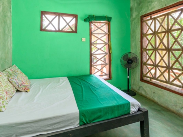 Luxury 2.7-acre creekfront property for sale in Mida Creek Watamu with ocean views, eco-lodge potential, and unique treehouse residence.