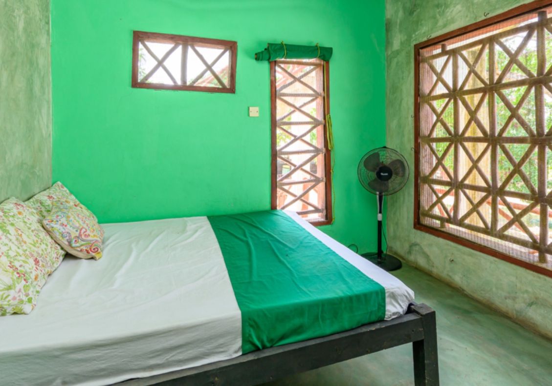 Luxury 2.7-acre creekfront property for sale in Mida Creek Watamu with ocean views, eco-lodge potential, and unique treehouse residence.