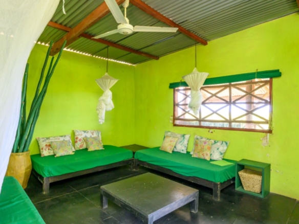 Luxury 2.7-acre creekfront property for sale in Mida Creek Watamu with ocean views, eco-lodge potential, and unique treehouse residence.