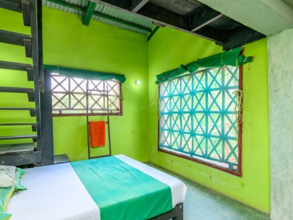 Luxury 2.7-acre creekfront property for sale in Mida Creek Watamu with ocean views, eco-lodge potential, and unique treehouse residence.